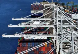 Trump's trade war is raising money for the government, but at whose expense?